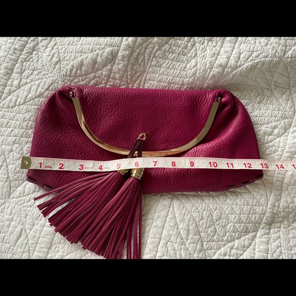 Tumi pink leather clutch w/purple lining and tassels - Picture 7 of 7